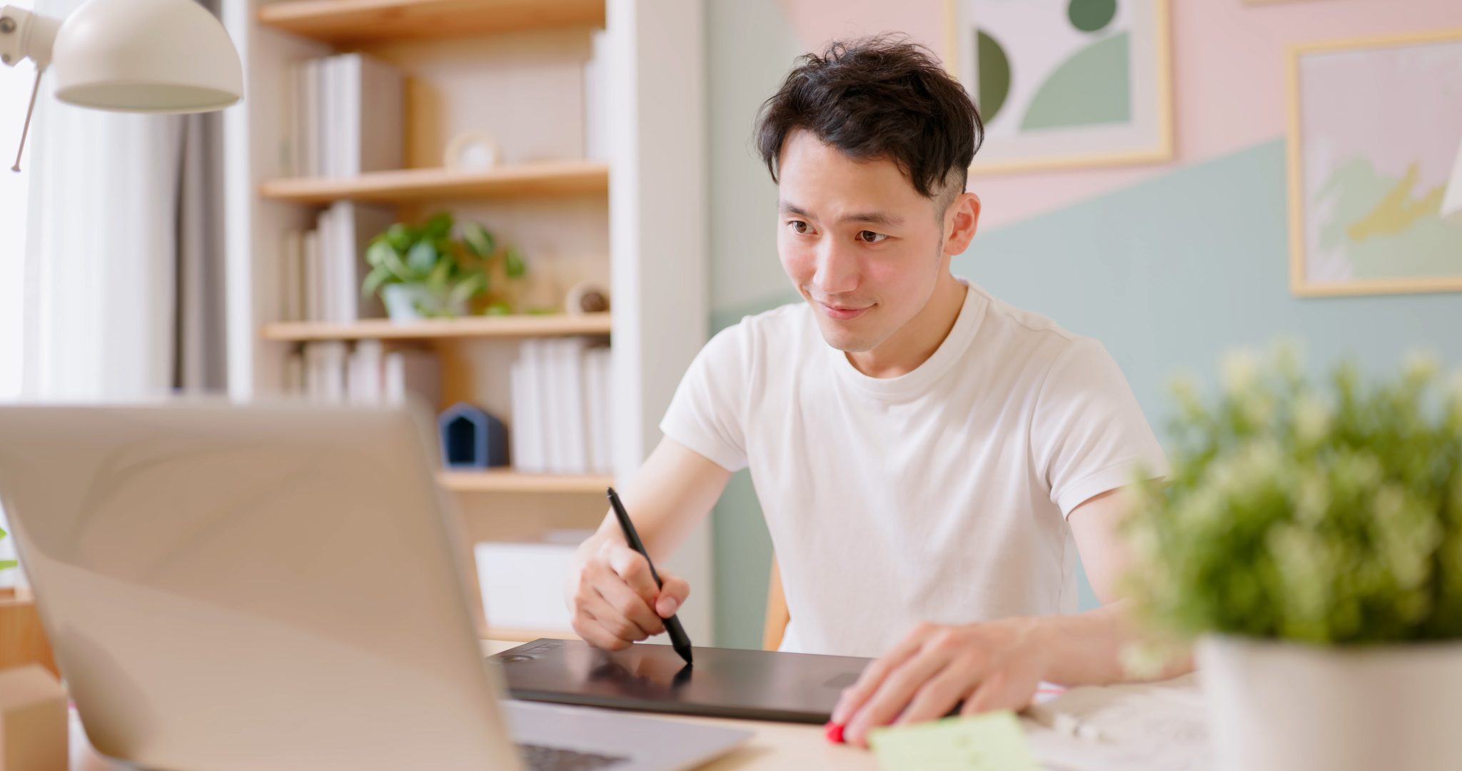 A man takes an insurance classes online.